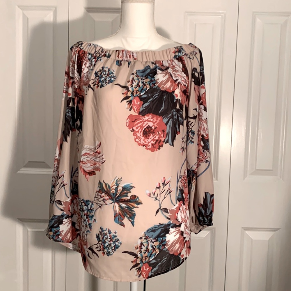 Pretty off the shoulder blouse. Size Xl can go with almost anything